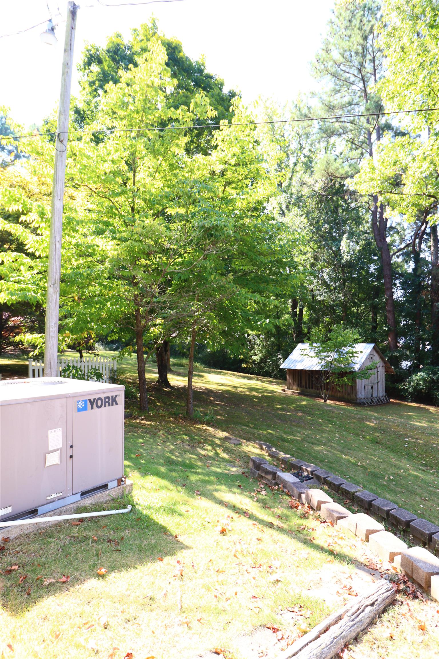 317 Purdy Road Selmer, TN 38375 - Photo 35 of 38 View of yard with a shed
