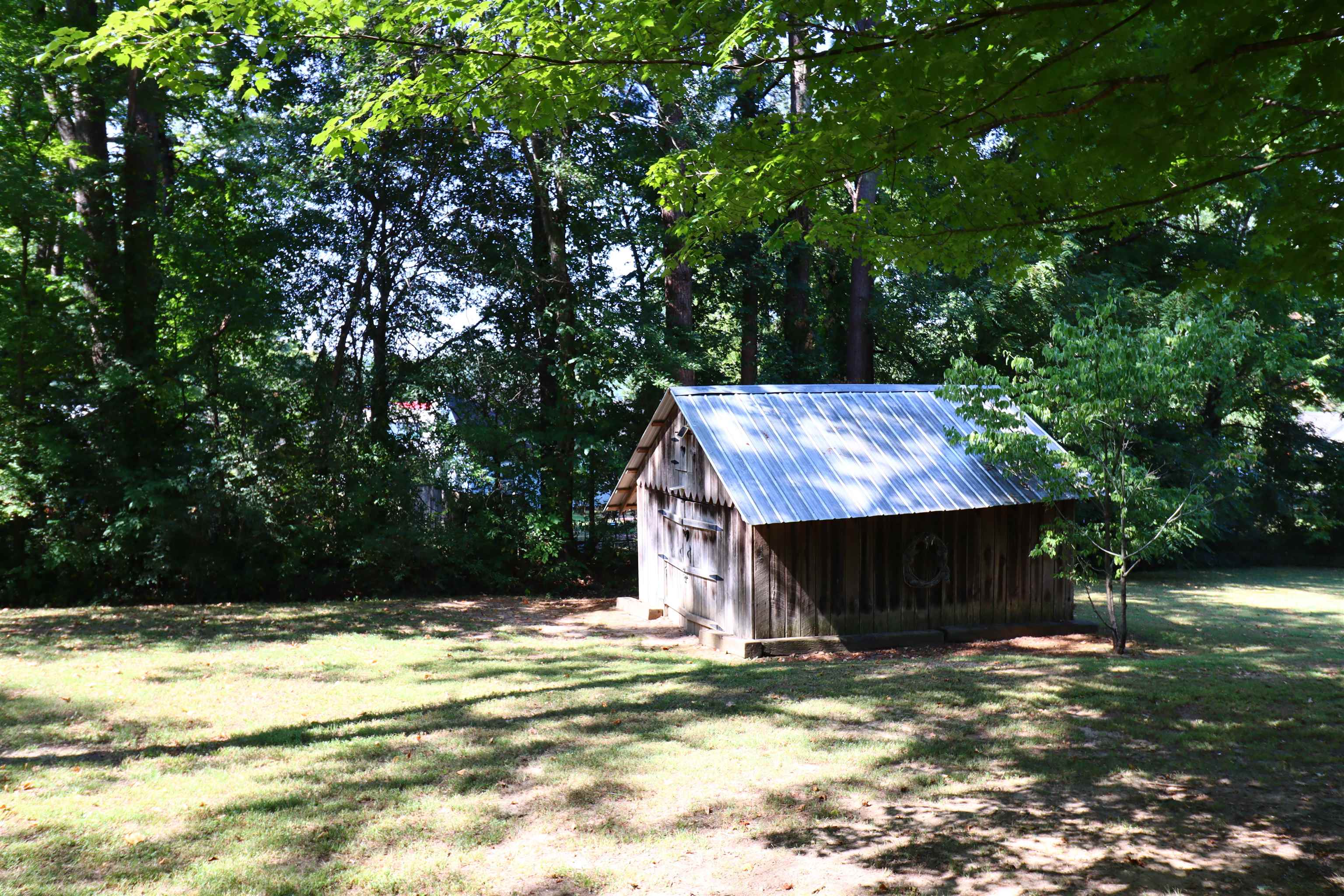 317 Purdy Road Selmer, TN 38375 - Photo 9 of 38 View of yard featuring an outdoor structure