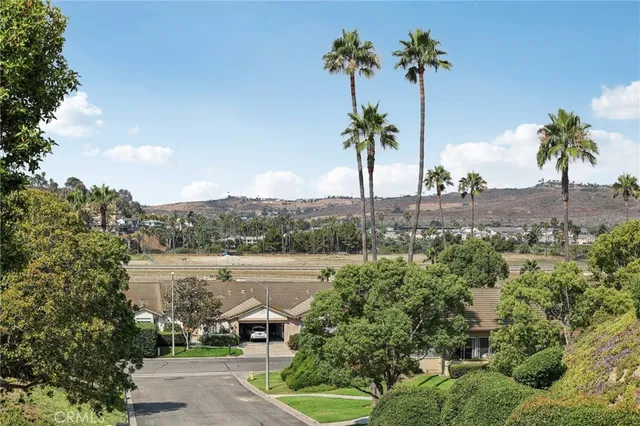 an aerial view of residential house and outdoor space