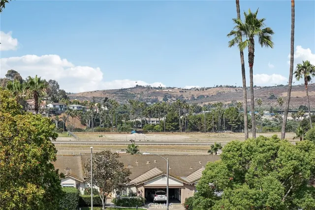 a view of an ocean and a mountain