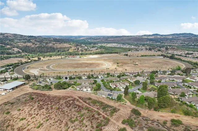an aerial view of a house with a garden