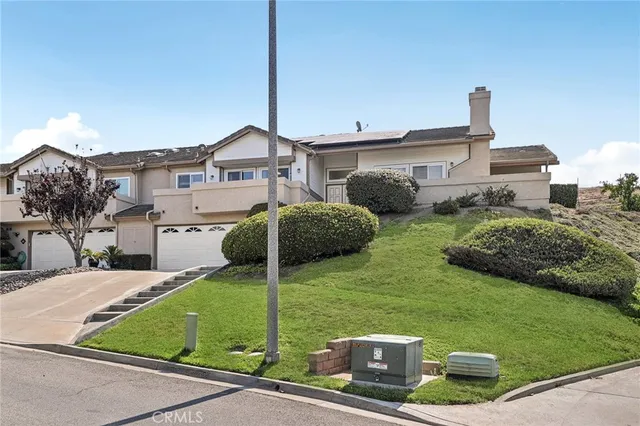 an empty room with a kitchen
