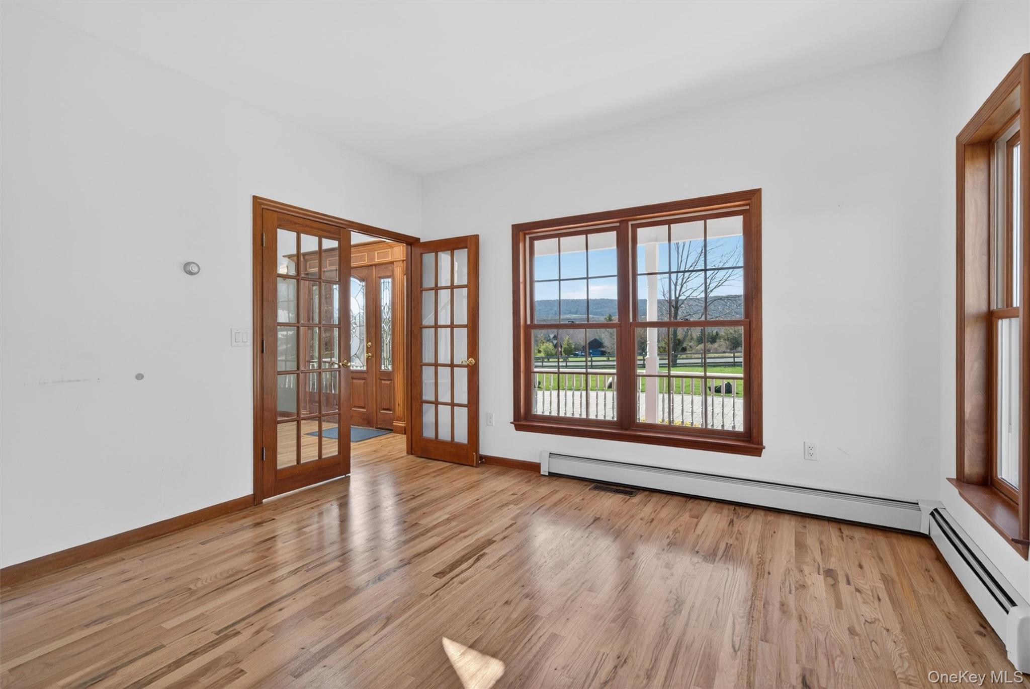 204 Brola Road Middletown, NY 10940 - Photo 8 of 50 Front room with French doors that would make a great library, office, sitting room , living room...endless options for you ro make your own.