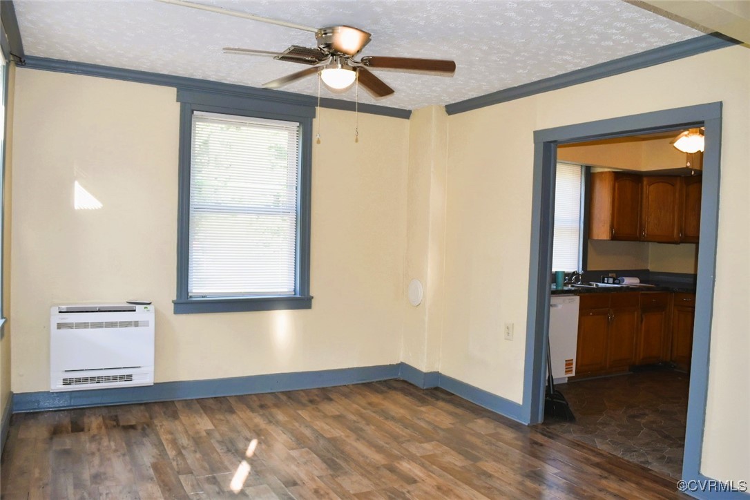 1642 Free State Road Meherrin, VA 23954 - Photo 3 of 24 a view of empty room with wooden floor and fan