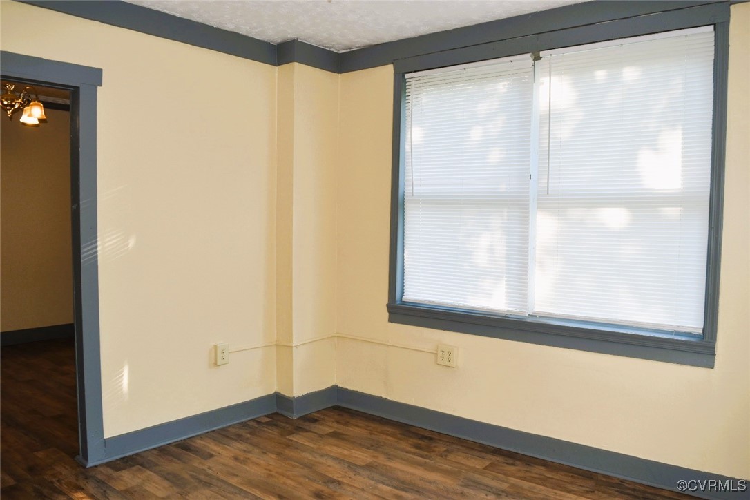 1642 Free State Road Meherrin, VA 23954 - Photo 4 of 24 a view of empty room with wooden floor and fan