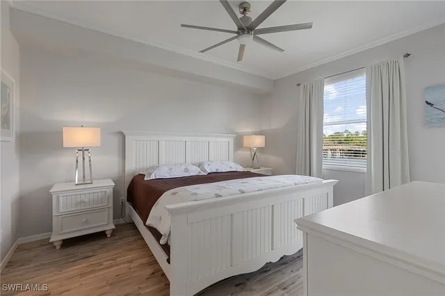 a bed room with a bed and a lamp