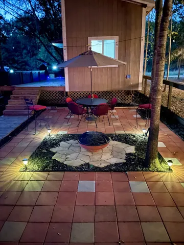 a view of a backyard of the house