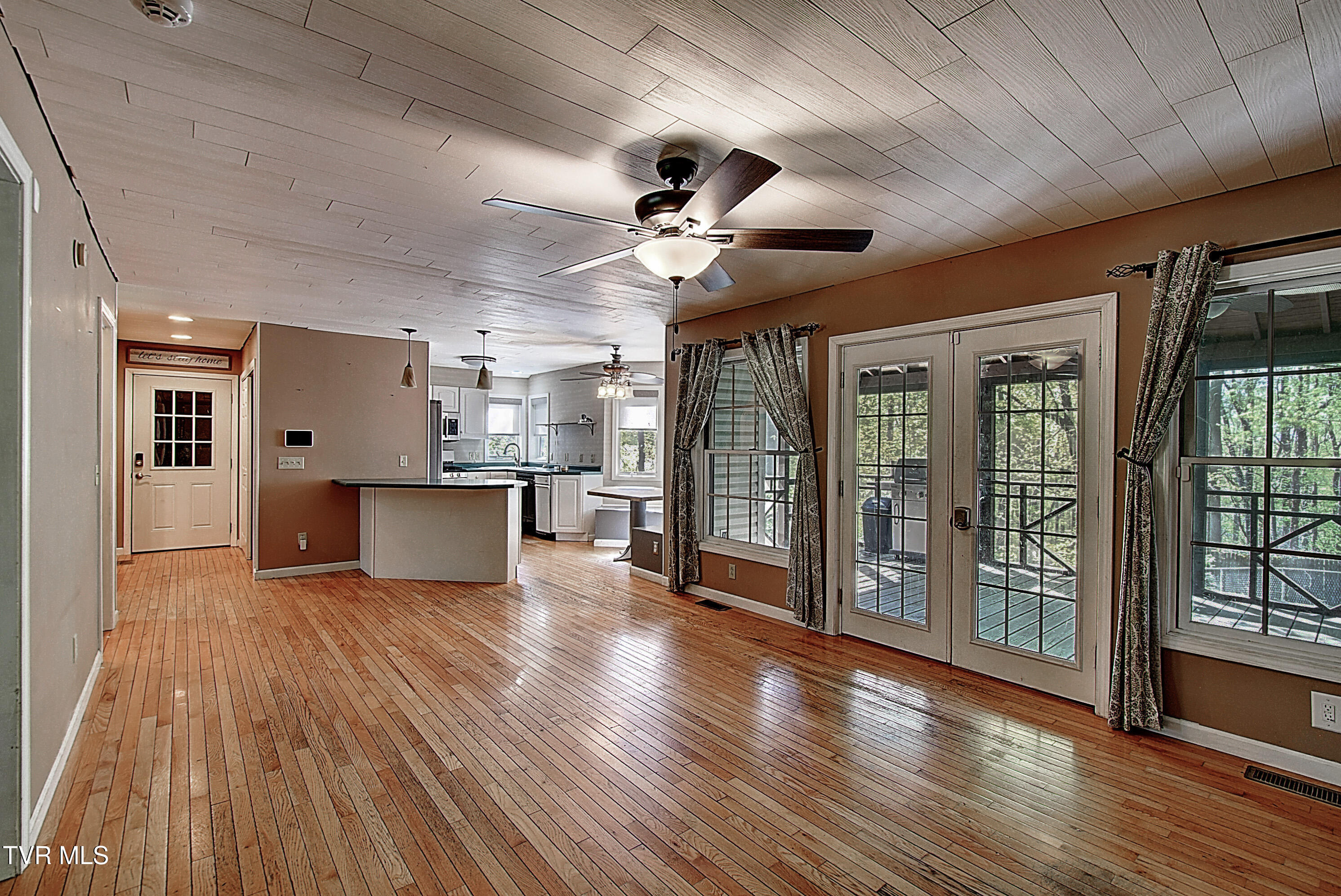 455 Carlton Road Bristol, TN 37620 - Photo 15 of 66 Den into breakfast nook and kitchen