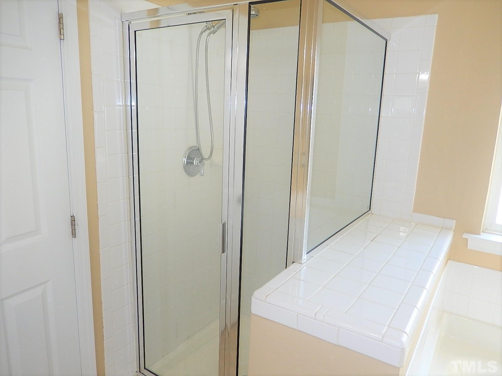 4717 Delta Ridge Court Raleigh, NC 27612 - Photo 16 of 30 a bathroom with a shower