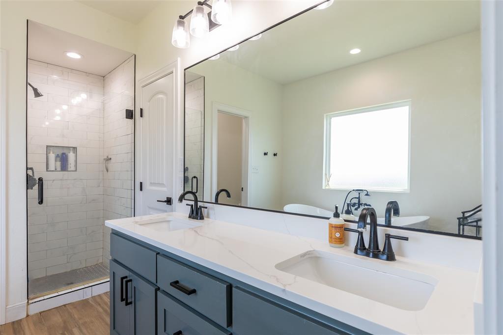 118 Corbyn Circle Tuscola, TX 79562 - Photo 17 of 36 a bathroom with a sink and a mirror