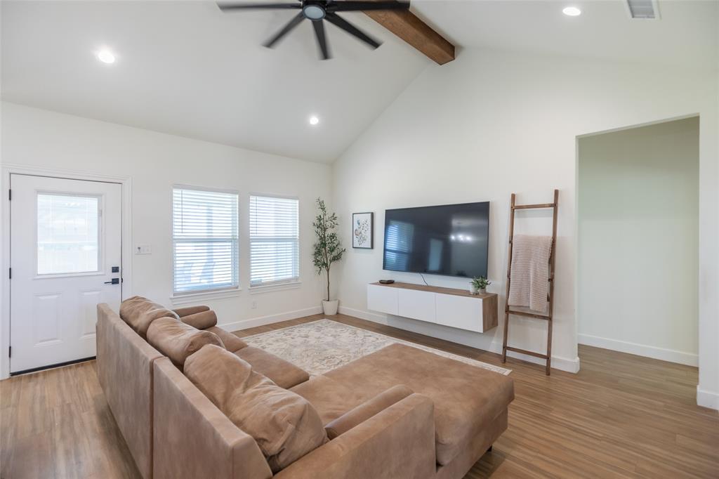 118 Corbyn Circle Tuscola, TX 79562 - Photo 3 of 36 a spacious bedroom with a bed and a flat screen tv