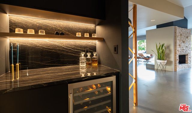 a kitchen with a sink cabinets and window