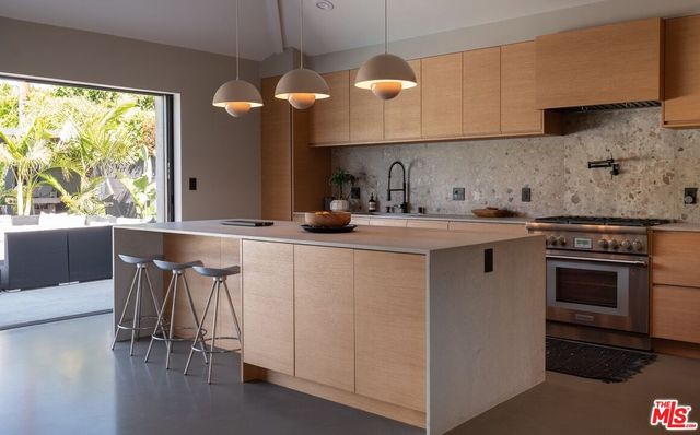 a kitchen with cabinets and a sink