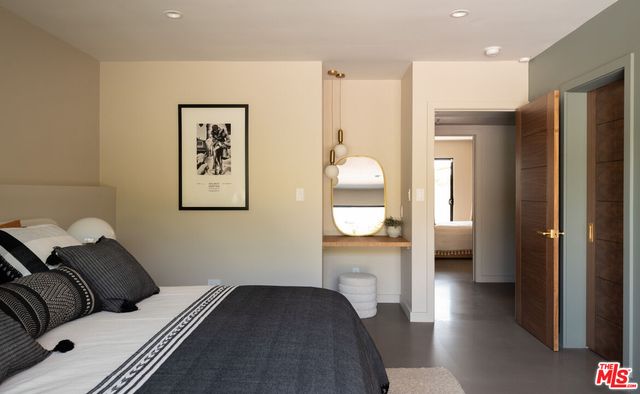 a view of hall way with mirror