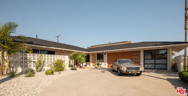 a car parked in front of house