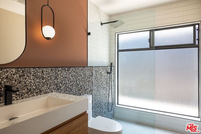 a living room with furniture and window