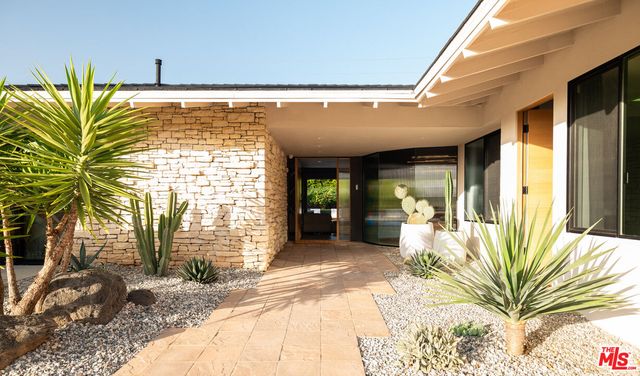 a view of a house with a patio