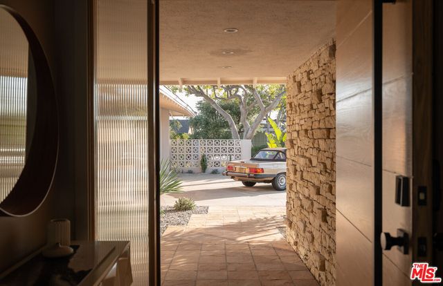 a living room with fireplace furniture and a flat screen tv