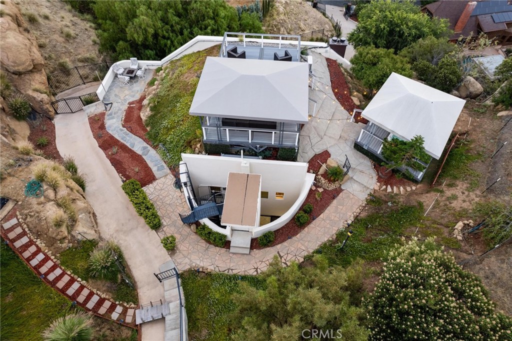 22870 Trigger Street Chatsworth, CA 91311 - Photo 13 of 64 an aerial view of a house with swimming pool and outdoor seating
