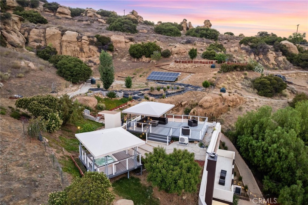 22870 Trigger Street Chatsworth, CA 91311 - Photo 15 of 64 an aerial view of a house with yard swimming pool and outdoor seating