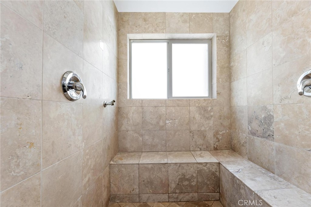 22870 Trigger Street Chatsworth, CA 91311 - Photo 31 of 64 a bathroom with a shower