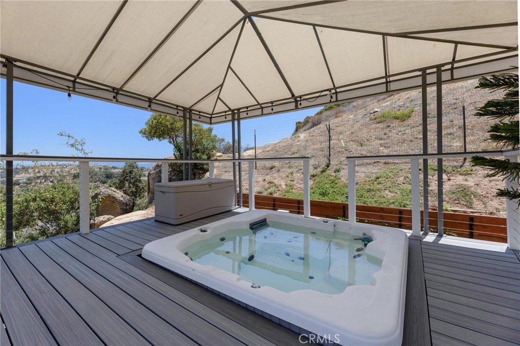 22870 Trigger Street Chatsworth, CA 91311 - Photo 53 of 64 a view of roof deck with table and chairs