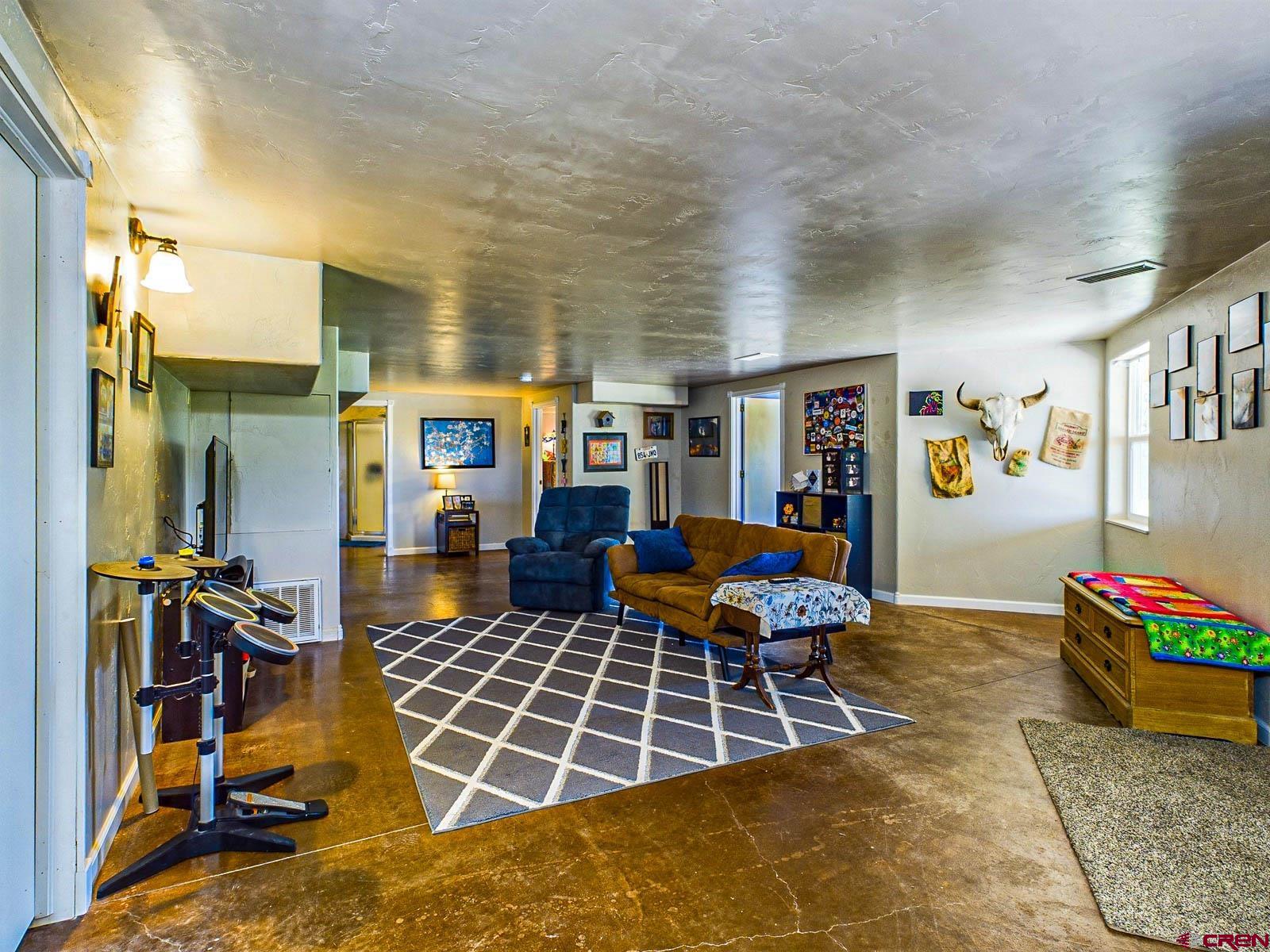 20260 Fawn Circle Eckert, CO 81418 - Photo 20 of 35 a view of a livingroom with furniture and gym equipment