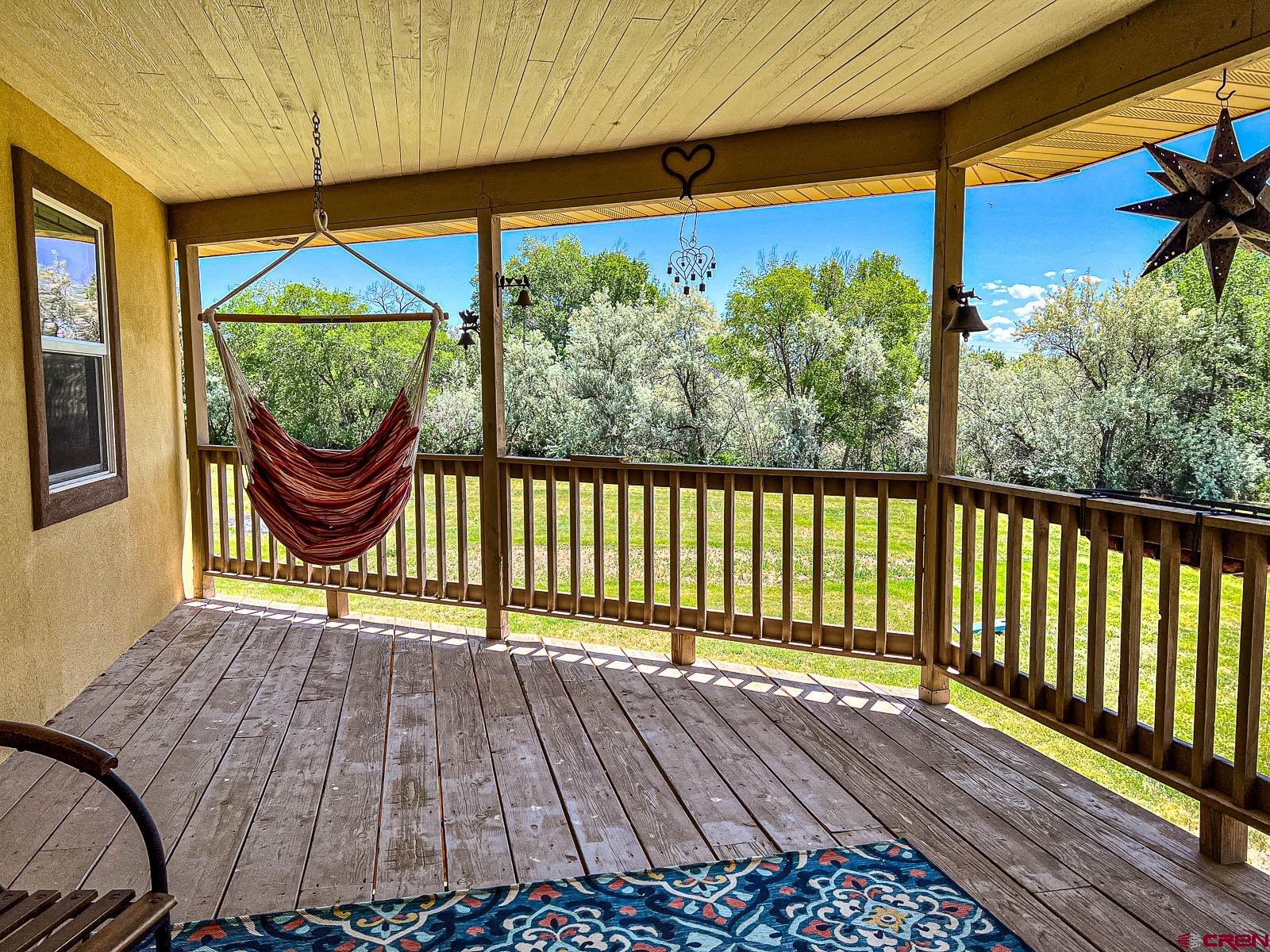 20260 Fawn Circle Eckert, CO 81418 - Photo 27 of 35 a view of a two chairs in the balcony