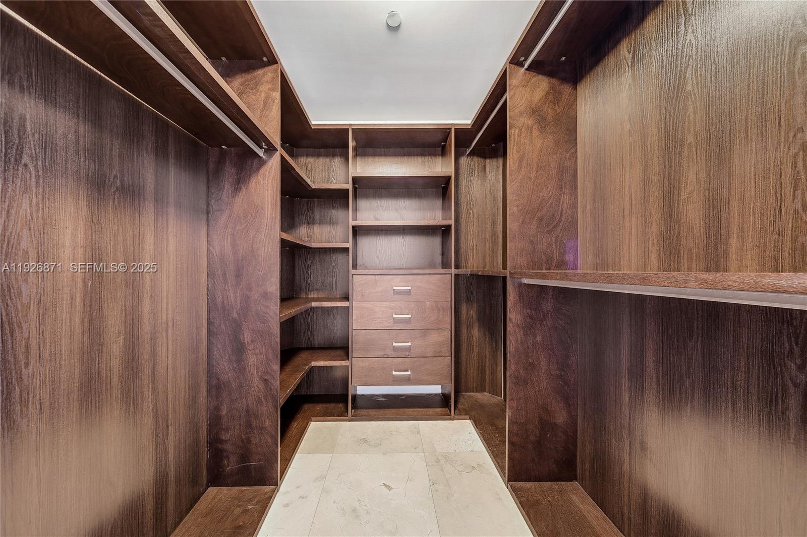 1100 Biscayne Boulevard, Unit 3103 Miami, FL 33132 - Photo 17 of 28 a view of walk in closet