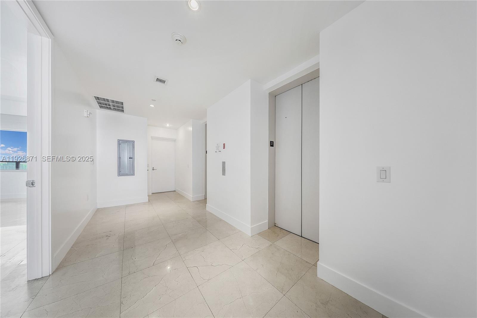 1100 Biscayne Boulevard, Unit 3103 Miami, FL 33132 - Photo 4 of 28 a view of a hallway