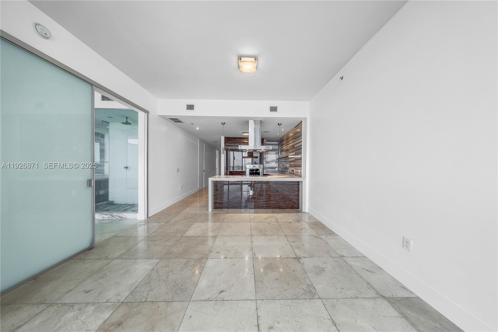 1100 Biscayne Boulevard, Unit 3103 Miami, FL 33132 - Photo 10 of 28 a view of a kitchen with a sink
