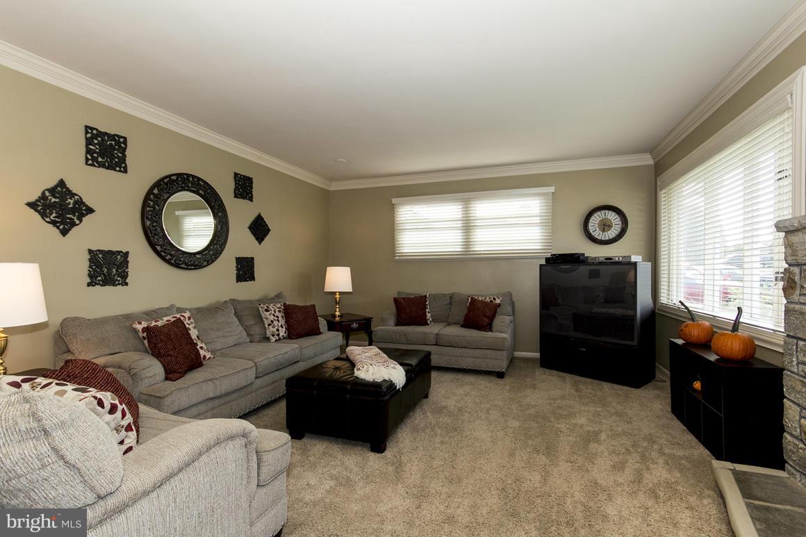4012 Kahlston Road Baltimore, MD 21236 - Photo 14 of 30 a living room with furniture and a window