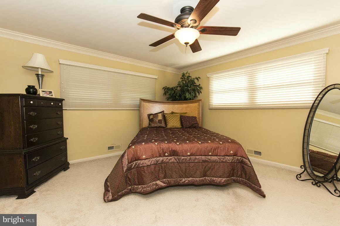 4012 Kahlston Road Baltimore, MD 21236 - Photo 16 of 30 a bedroom with a bed and a window