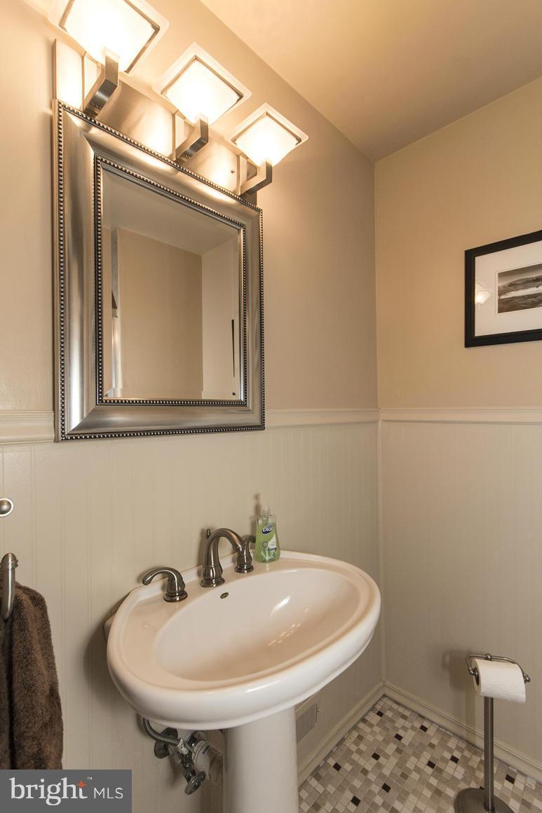 4012 Kahlston Road Baltimore, MD 21236 - Photo 25 of 30 a bathroom with a sink and a mirror