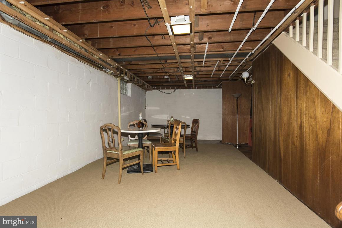 4012 Kahlston Road Baltimore, MD 21236 - Photo 26 of 30 a patio with a table and chairs