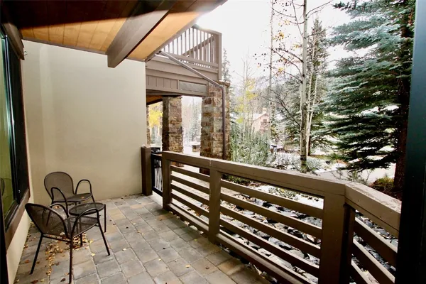 a view of balcony with furniture