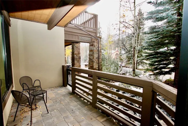 a view of balcony with furniture