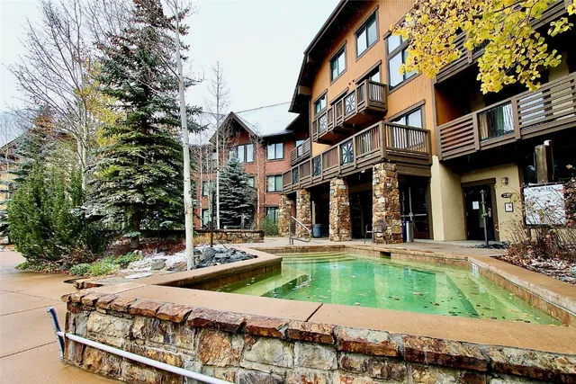 a view of a house with swimming pool