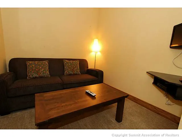 a view of workspace with lounge chair