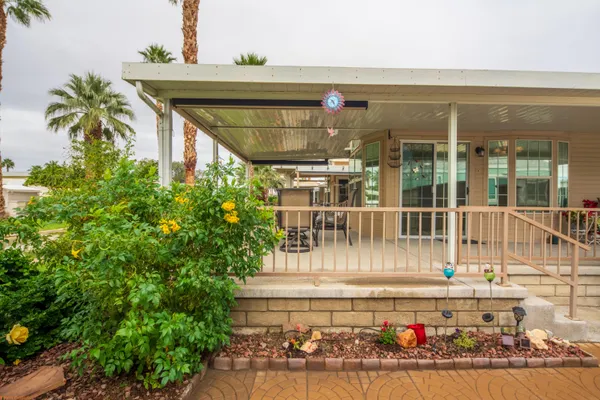 a view of a garden with a fountain