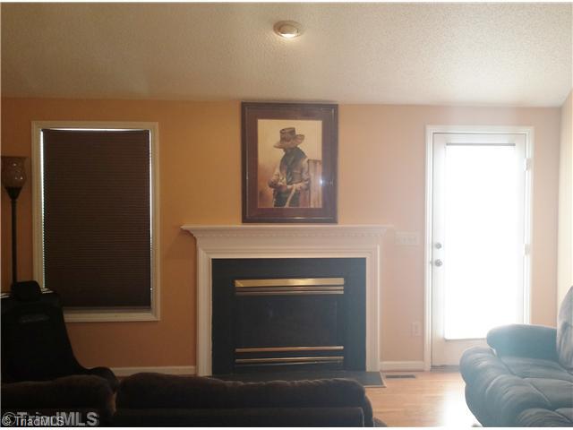 8609 Haw River Road Oak Ridge, NC 27310 - Photo 2 of 15 Living Room.