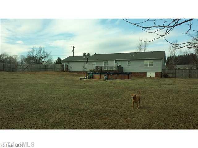 8609 Haw River Road Oak Ridge, NC 27310 - Photo 14 of 15 Exterior Back.