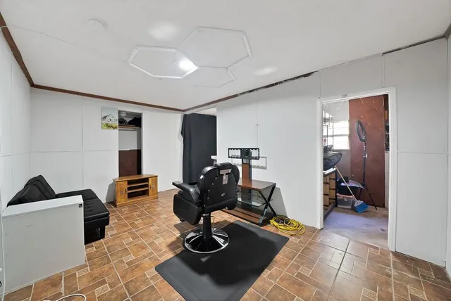 a room with furniture and a window