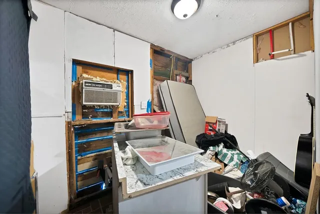 a view of a house with a back yard