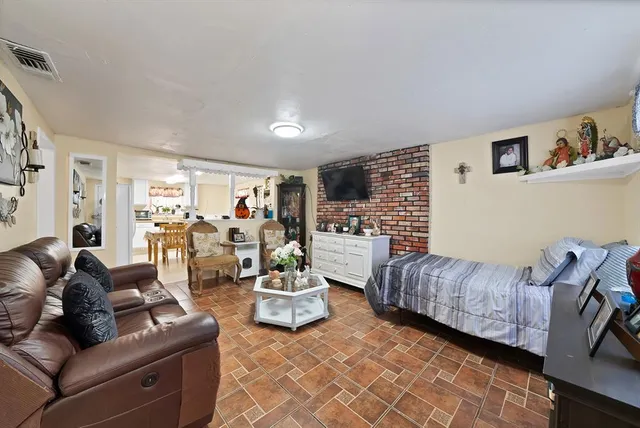 a living room with furniture and a couch