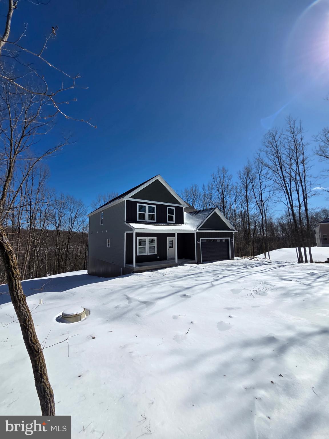 180 Stone Ridge Albrightsville, PA 18210 - Photo 21 of 23 a front view of a house with a yard
