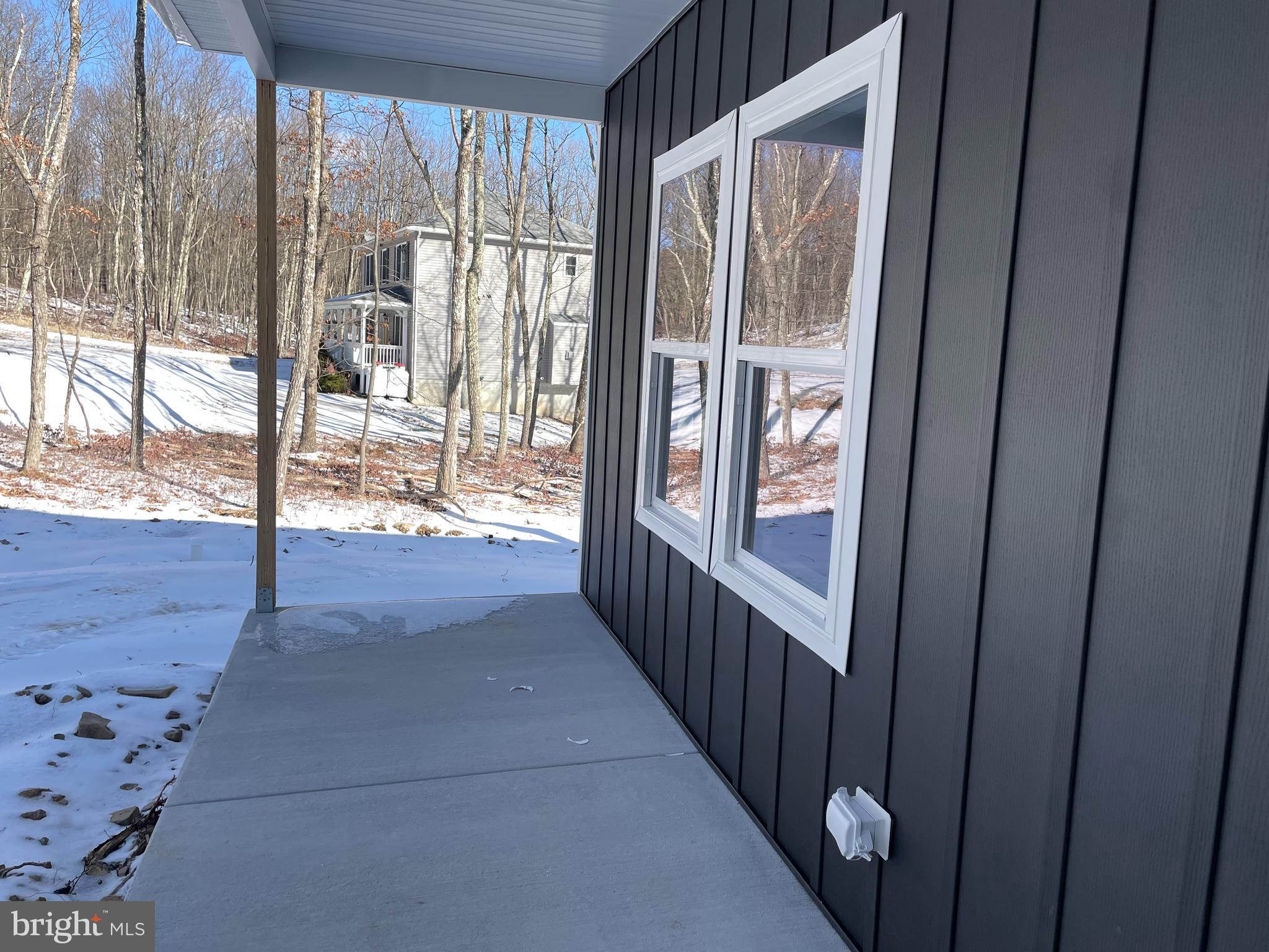 180 Stone Ridge Albrightsville, PA 18210 - Photo 23 of 23 a view of entryway with wooden floor and door