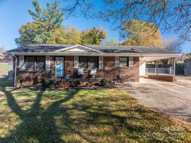 a view of a backyard with a patio