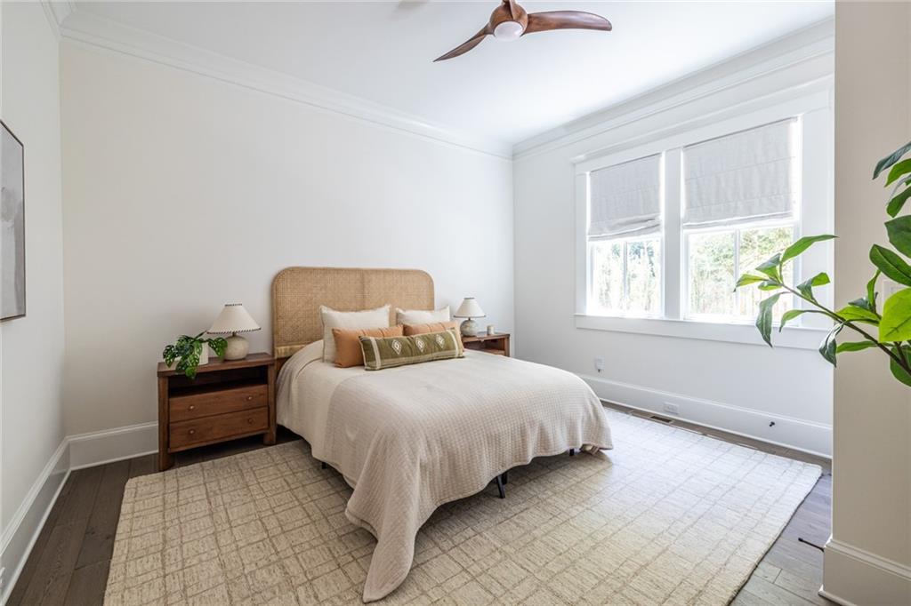 538 Ansley Street Decatur, GA 30030 - Photo 26 of 73 a bedroom with a bed and windows