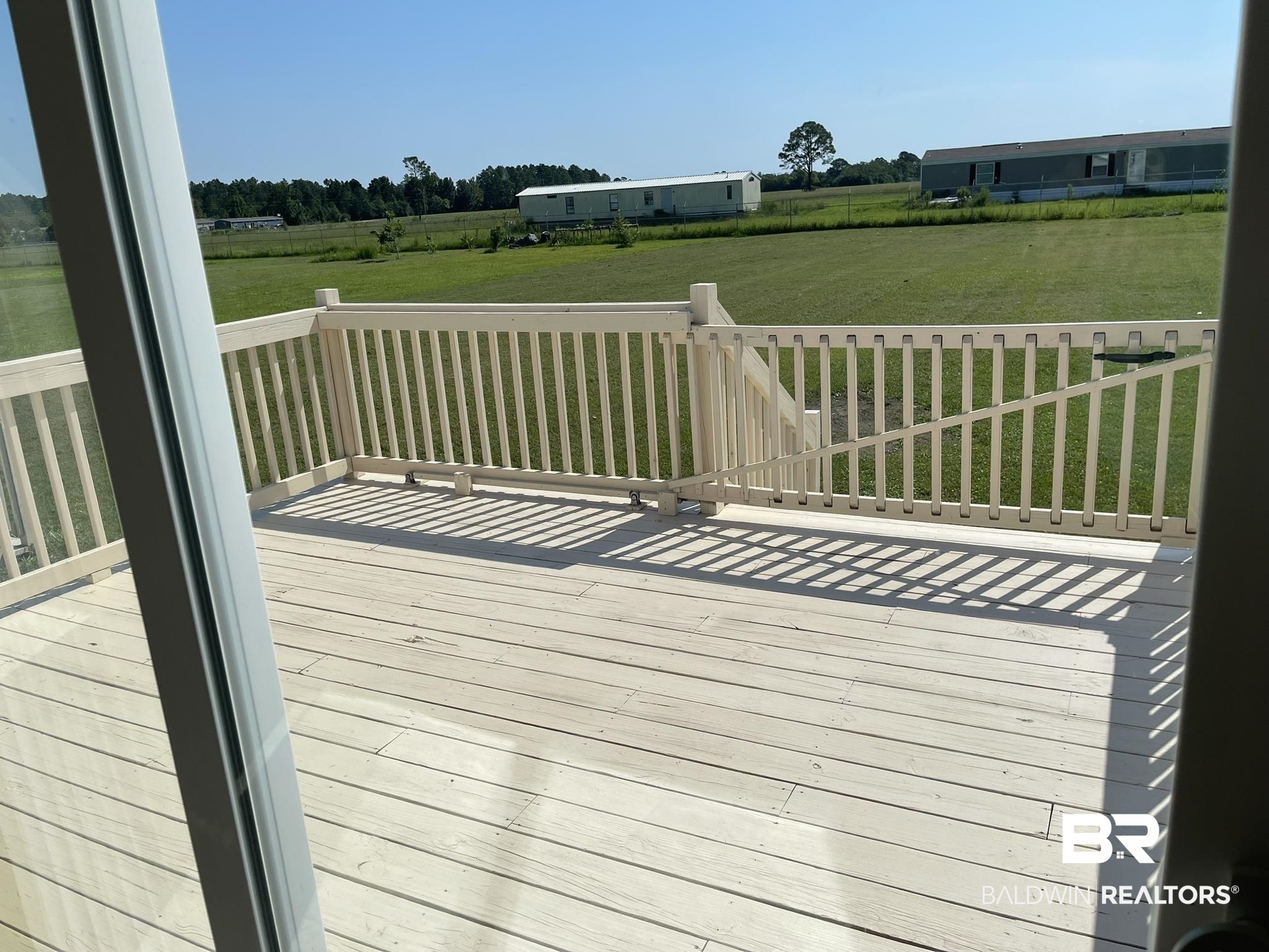 16802 County Road 87 Elberta, AL 36530 - Photo 18 of 19 Wooden deck featuring a yard and a view of rural / pastoral area